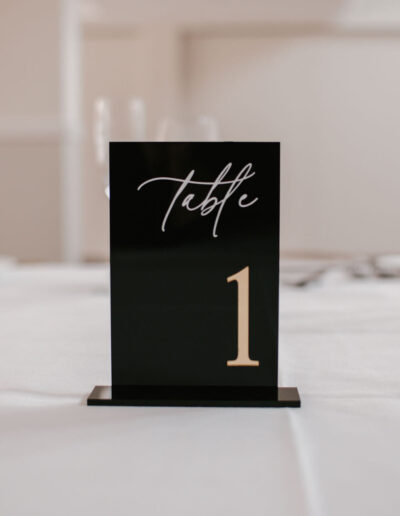 Black acrylic table number with gold numeral