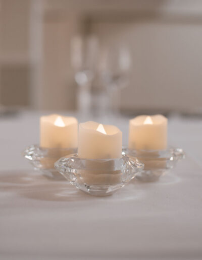 Three crystal diamond-cut tealight holders