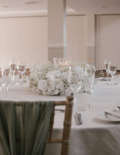 White gypsophila and orchid centrepiece